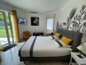 Appartements STUDIO BEAUREGARD - TERRASSE et JARDIN : photos des chambres