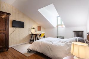 B&B / Chambres d'hotes La maison des couturieres : photos des chambres