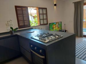 Mamanguá - Apto c piscina, 50mts da praia, cozinha, churrasqueira, ar con, WiFi, netflix, garagem