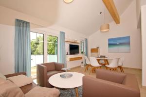 strandnahe FeWo mit Balkon, gratis Nutzung vom AHOI Erlebnisbad und Sauna in Sellin - Rex Rugia FeWo 11-6