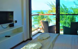 Na praia - Araça 305 Super luxo - Frente mar