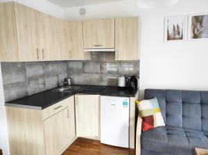 Apartament ul Marynarska 4 lok 12