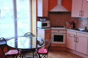 Appartements Aux 3 Loups : photos des chambres