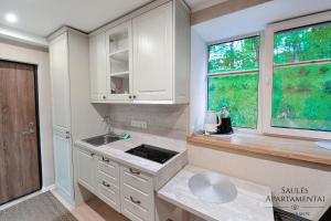 Saulės Aparatmentai