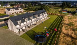 Spokojne Miejsce - domki - apartamenty nad morzem