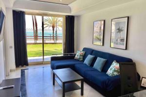 Frontline sea in the center of Puerto Banus.2bedrooms -Garden
