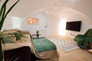 Appartements * CALME ET COZY *WIFI*VUE IMPRENABLE* : photos des chambres