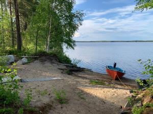 Upea hiekkaranta mökki