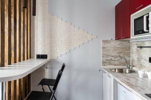 One-Bedroom Apartment room in Дизайнерская студия Loft Style