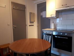 Appartement confortable face à la montagne