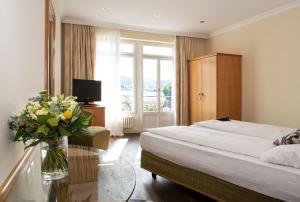 Superior Twin Room with Lake View and Balcony room in Hotel Seeburg