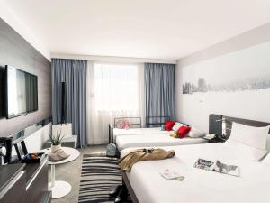 Hotels Novotel Paris Centre Gare Montparnasse : photos des chambres