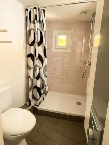 Appartements New! Cosy T2 au coeur de la ville - climatisation - coin terrasse : photos des chambres