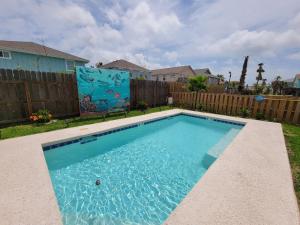 Three-Bedroom House room in Living The Salty Life In Flip Flops home