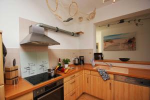 F-1093 Villa Elise FeWo 03 Veranda, Gartennutzung