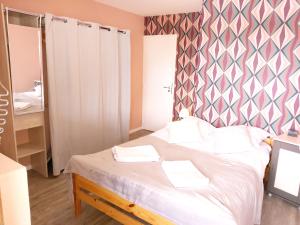 Appartements Le Petit Clos : photos des chambres
