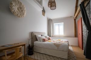 Appartements KRAFFT, centre ville, climatise, baignoire double - La Cle des Sacres : photos des chambres