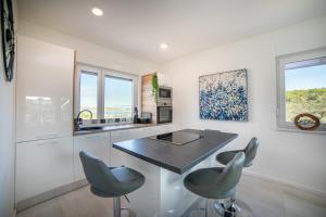 4 star Duplex apartment "Maginja", with private heated POOL & seaview