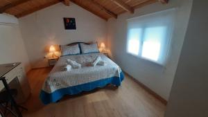 White Manolia Cottage