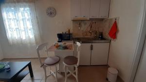 White Manolia Cottage