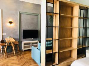 Appartements Meubles de l'Arsenal coeur de ville ! : photos des chambres