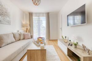 Appartements L'Elysee - Easy check-in - Arrivee autonome - Place parking privative - T2 surequipe - Wifi - Netflix : photos des chambres