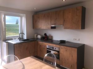 PEGASUS I - 2 chambres de luxe, cuisine, salon, 2 terrasses et sauna