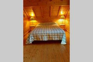 Chalets Maison de bois finlandaise au pied des pistes : photos des chambres