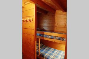 Chalets Maison de bois finlandaise au pied des pistes : photos des chambres