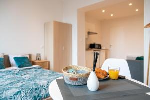 Appartements COSY LOCATION - Confortable, cosy et equipe - Places gratuites a proximite : photos des chambres