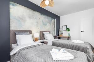 Nowoczesny Apartament z 2 Sypialniami z Widokiem na Miasto by Noclegi Renters