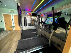 Appartements Capsule Wellness - sauna - balneo - machine de sport privatif - PS5 - 2 chambres : photos des chambres