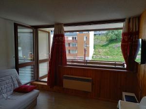 Appartements Studio 4 personnes centre Superbesse : photos des chambres