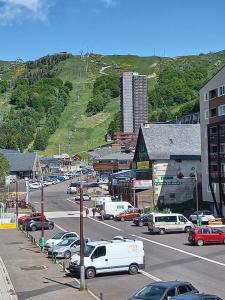 Appartements Studio 4 personnes centre Superbesse : photos des chambres