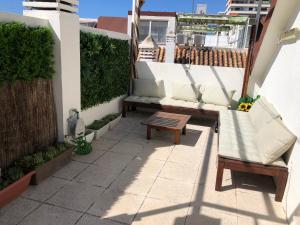 El Cortijuelo. Magnificent triplex terraced house with rooftop of 18m2, overlooking the sea. Parking