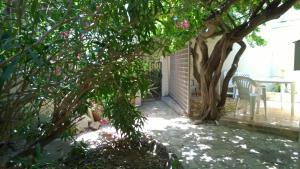 Logement climatisé avec jardin et parking pour 2 personnes en bord de plage