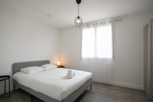 Appartements Magnifique T4 refait a neuf spacieux et lumineux : photos des chambres