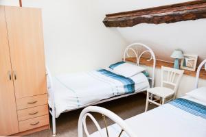 Maisons de vacances La Maison Neuve near Bagnoles de l'Orne : photos des chambres