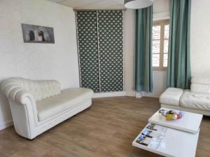 Appart'hotels Appartement Jarnioux - Les Meubles des Pierres Dorees : photos des chambres