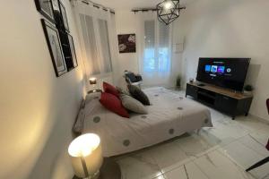 Appartements Le Dolce Vita - Centre historique, proche toutes commodites, stationnement aise, Wifi-Netflix : photos des chambres