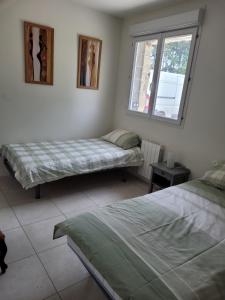 Maisons de vacances UN AIR DE VACANCES : photos des chambres