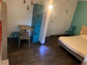 Hotels hotelF1 Saint Witz A1 Hotel : photos des chambres