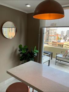 Apartament Condo Amueblado, ENCOMENDEROS 200 El Golf, Las Condes Santiago con vista al Costanera Center