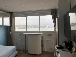 Appartements Studio Bord de Mer (Wifi + Netflix) : photos des chambres