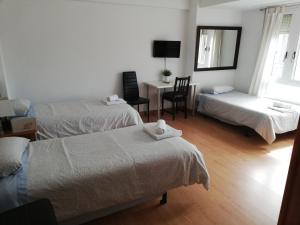 Triple Room with Shared Bathroom room in Pension Santa Rita
