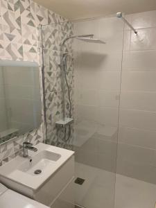 Appartements Apartment With Sea View : photos des chambres