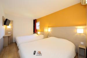 Hotels Hotel Kennedy Parc des Expositions : Chambre Quadruple (4 Lits Simples)