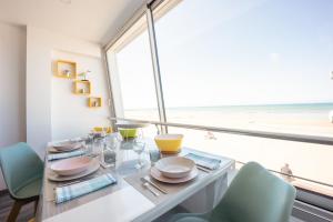 Appartements Les Vagues : photos des chambres