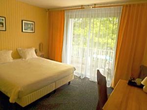 Hotels Cajarc Blue Hotel : photos des chambres