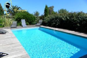 Villas Maison de vacances T3 piscine jacuzzi privee 5 min Mer : photos des chambres